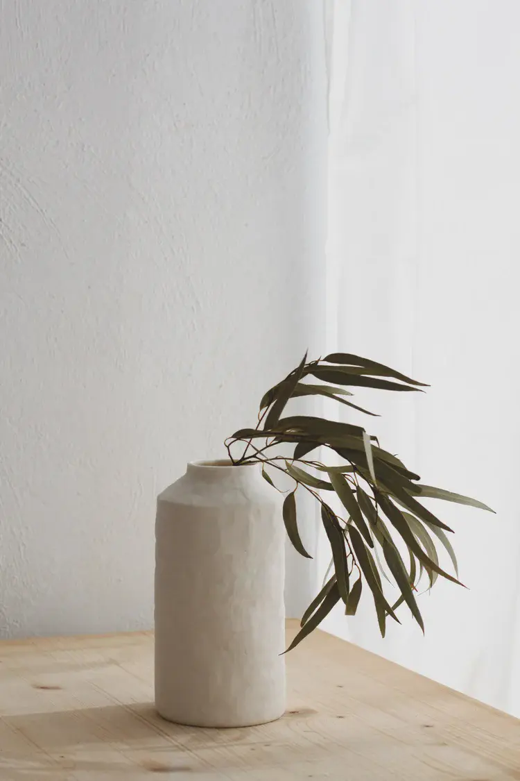 Hand-built porcelain jar with soft lavender stain