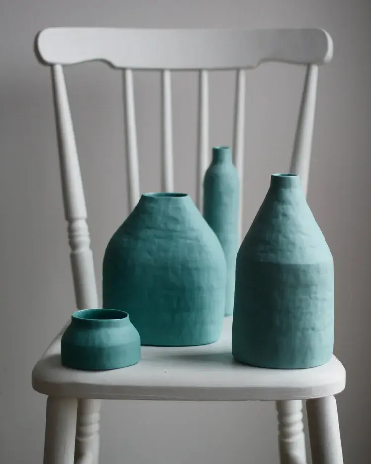 Cluster of small porcelain cups in pastel shades