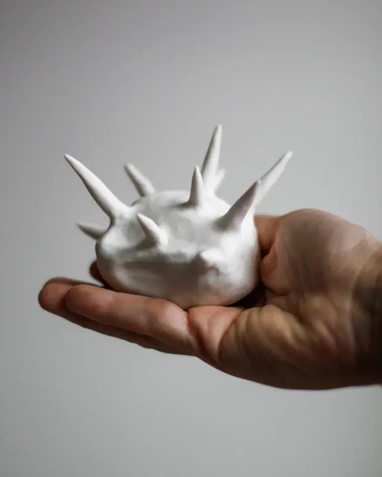 Porcelain vessels arranged as a Morandi-inspired still life