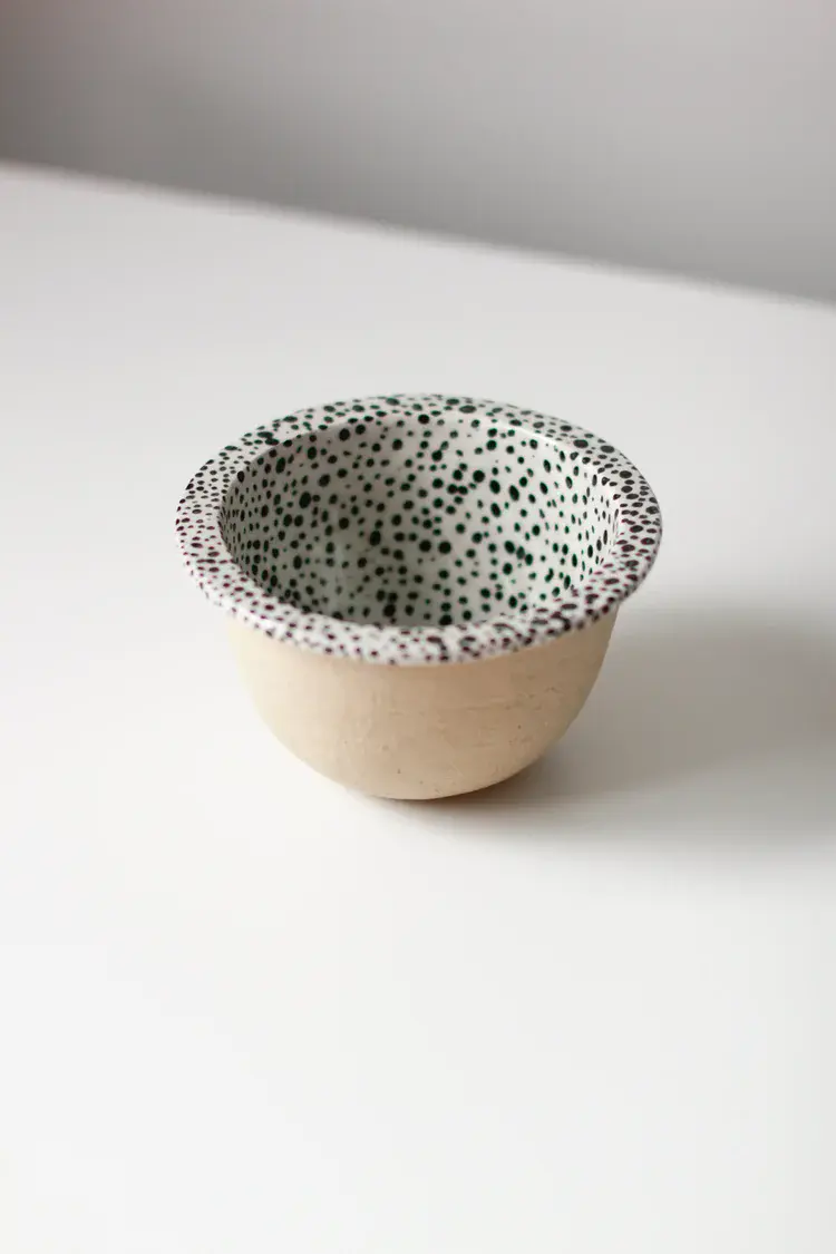 Handmade ceramic bowl featured in magazine spread