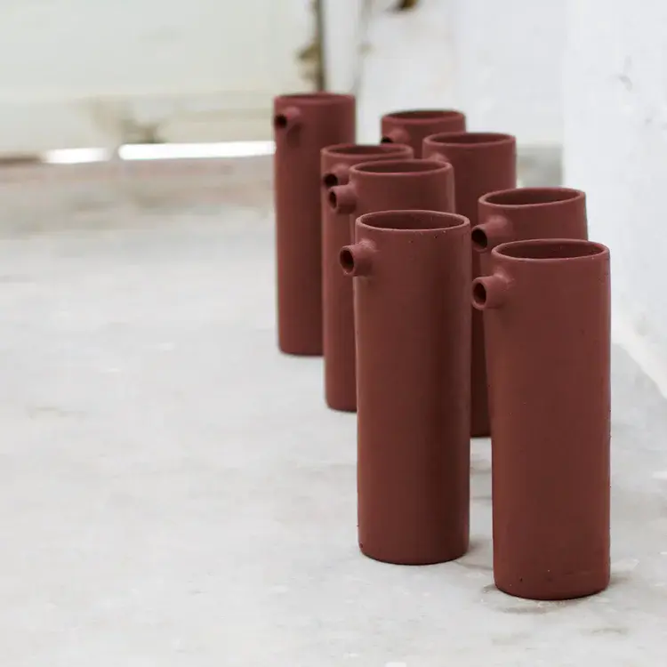 Unglazed seagull jug revealing raw clay surface