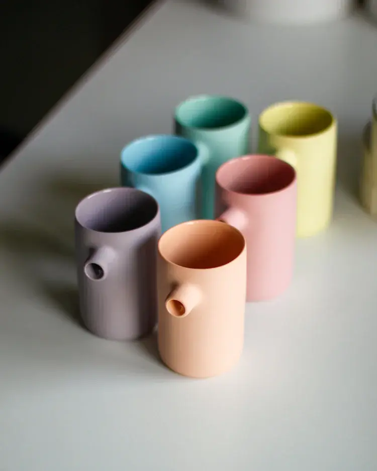 Seagull jug used as a flower vase with wildflowers