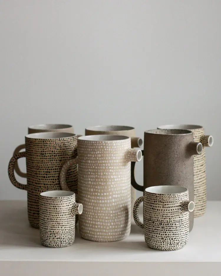 Seagull jug with elegant curved form in dark stoneware