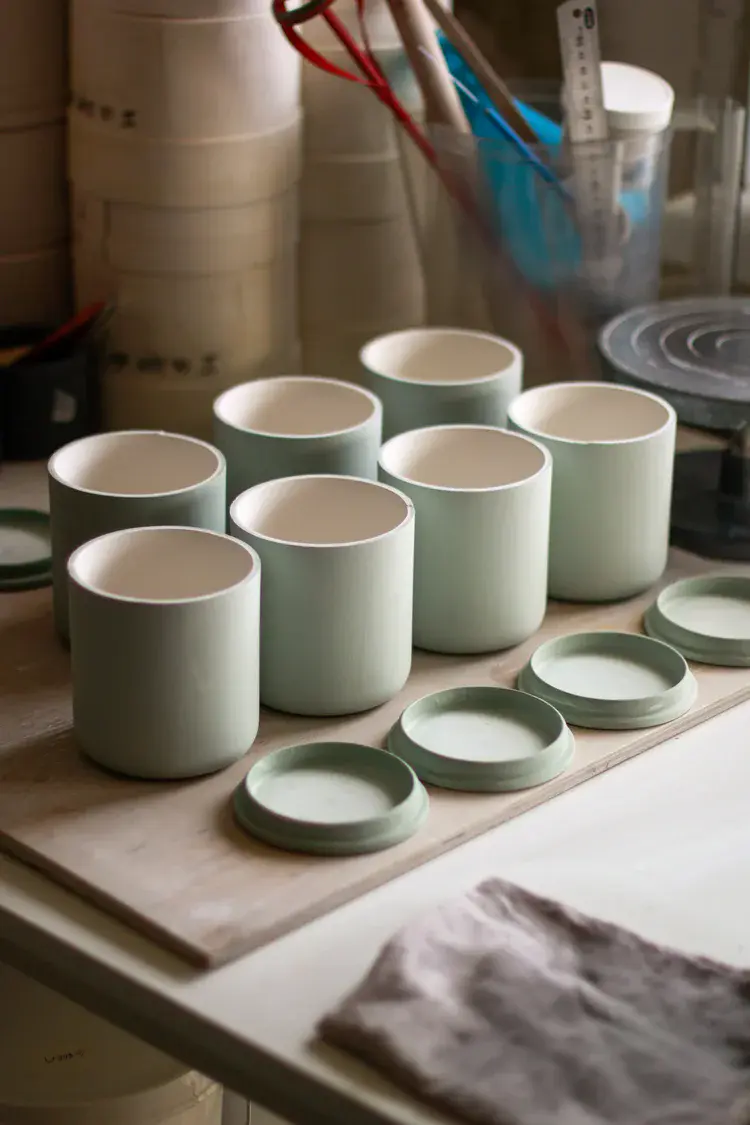 Group of slip-cast ceramics in mixed pastel glazes