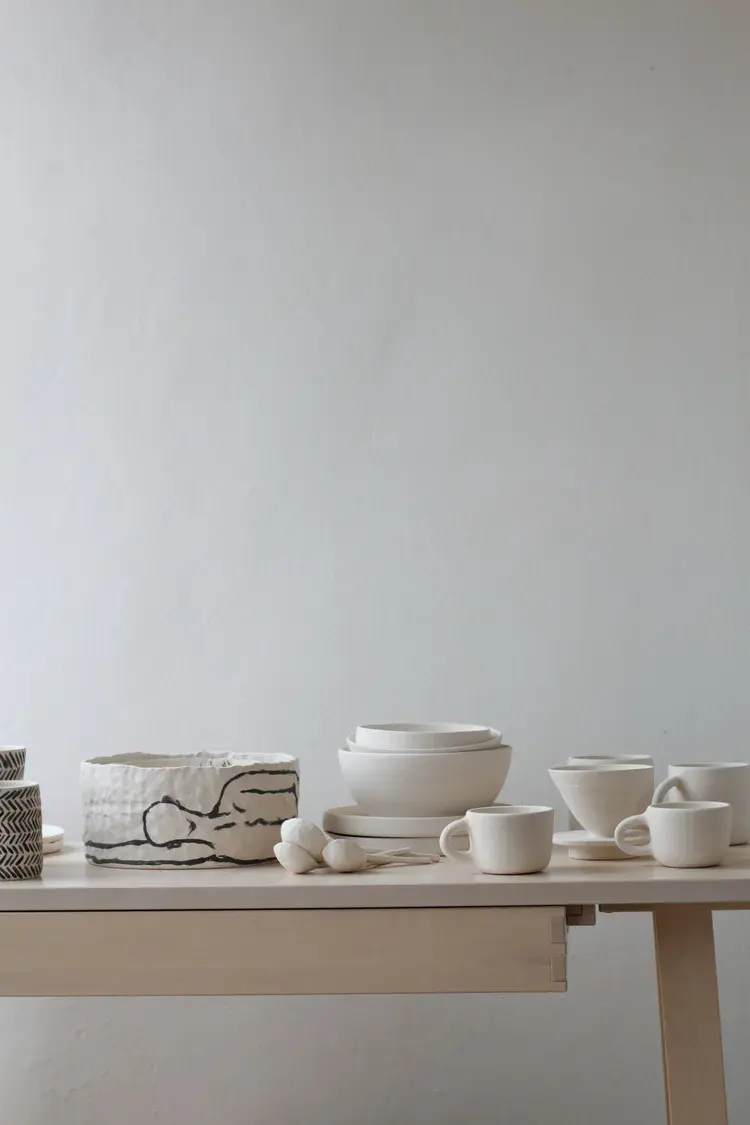 Hand-built stoneware pitcher in warm sandy glaze