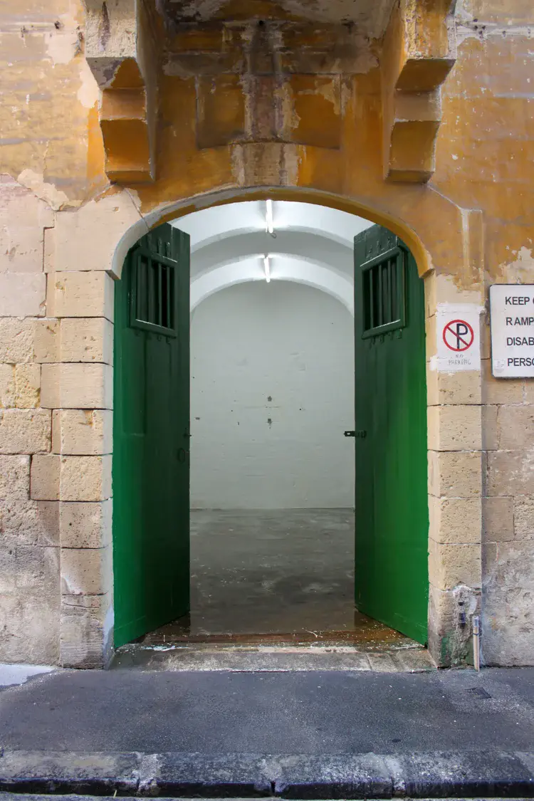Studio window casting natural light across the workspace