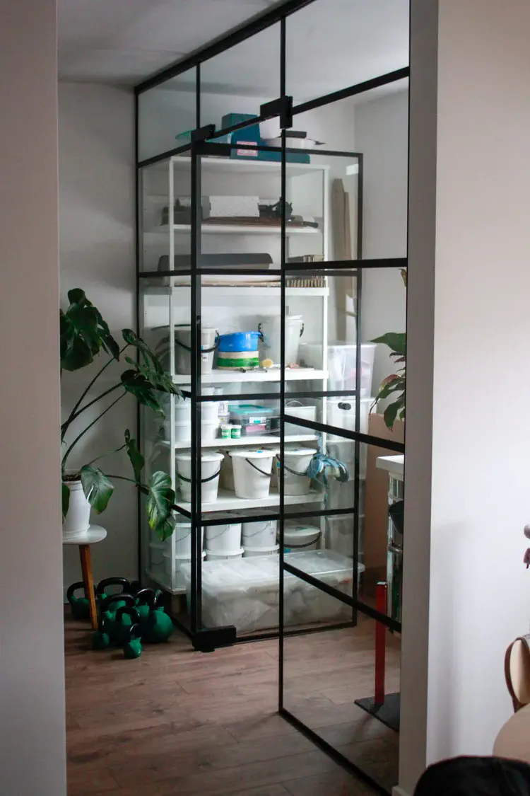 Finished stoneware pieces displayed in studio light