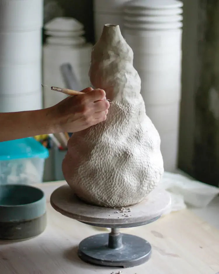 Studio workspace bathed in warm afternoon light