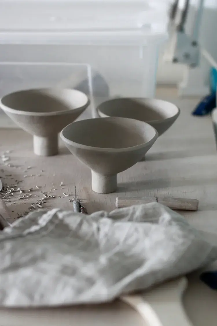 Peaceful pottery studio view with ceramics and natural materials